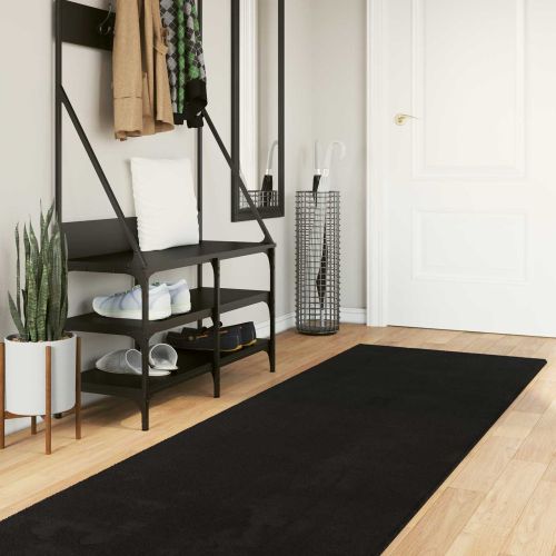Килим с среден косъм, мек и подходящ за пране HUARTE Черен