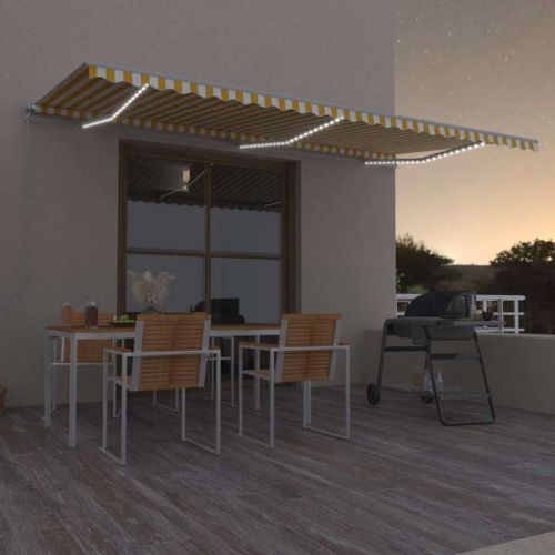 Ръчно прибиращ се сенник с LED, 600x300 см, жълто и бяло
